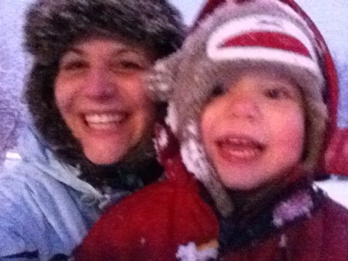 Mommy and Noah snuggling in the snow. We had fun playing outside. 
