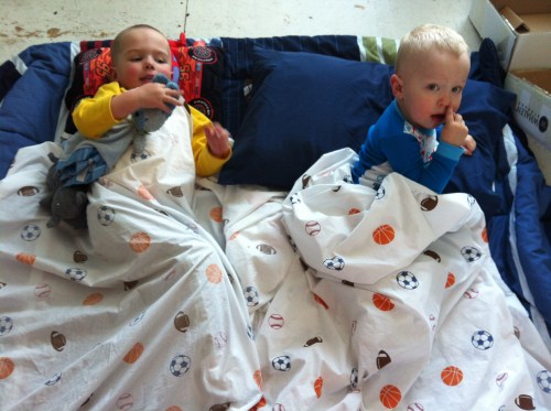 The boys were such good helpers. They made their "bed" on the kitchen floor using their new sheets and blankets (a Christmas gift). 
