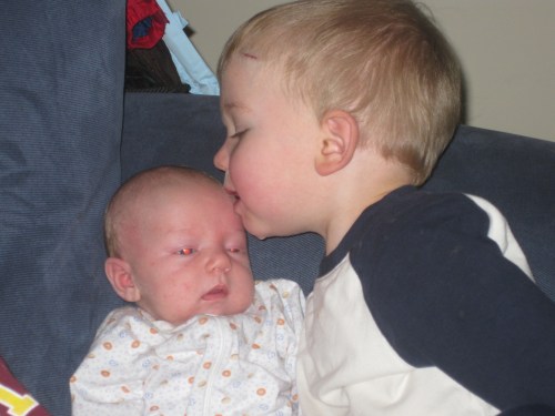 Eli loves his baby brother, Noah. 